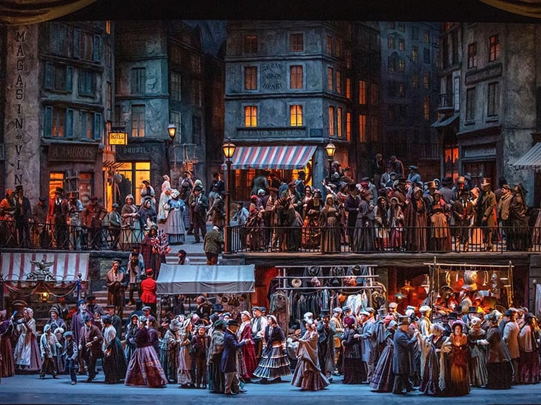 A scene from Act II of Puccini's "La Bohème." Photo: Evan Zimmerman/Met Opera