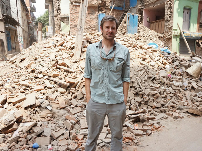 0513-nepal -in -front -of -rubble -p