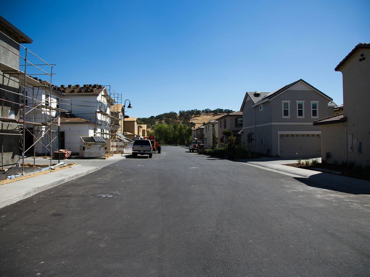 Construction goes on in a housing development in Folsom, Calif.