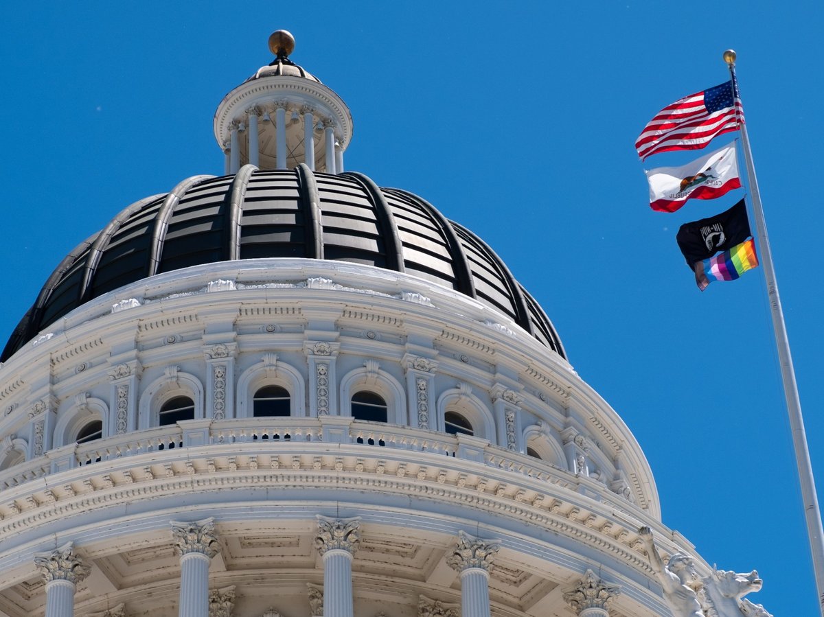 A pride flag hangs at the California capitol in June 2019 for Pride Month.