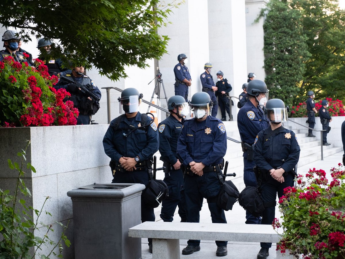 California Highway Patrol officers stand outside the California state Capitol in downtown Sacramento during a protest on June 3, 2020.