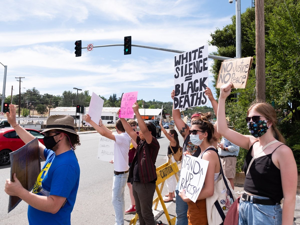 Demonstrator in Jackson, Calif. show support of Black Lives Matter Wednesday, June 10, 2020.