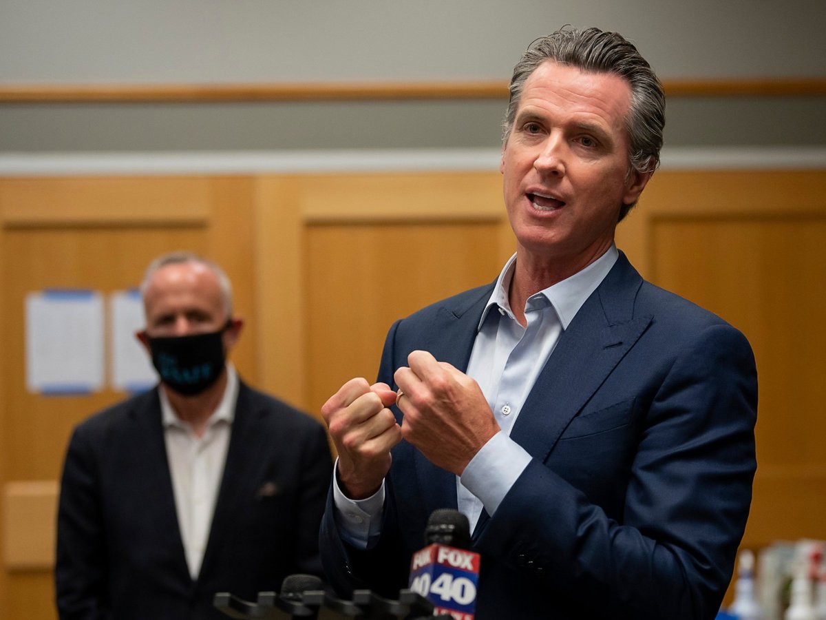 California Gov. Gavin Newsom speaks at a cooling center at the Tsakopoulos Library Galleria in Sacramento with Mayor Darrell Steinberg on Tuesday, Aug. 18, 2020 during a heat wave in the state.