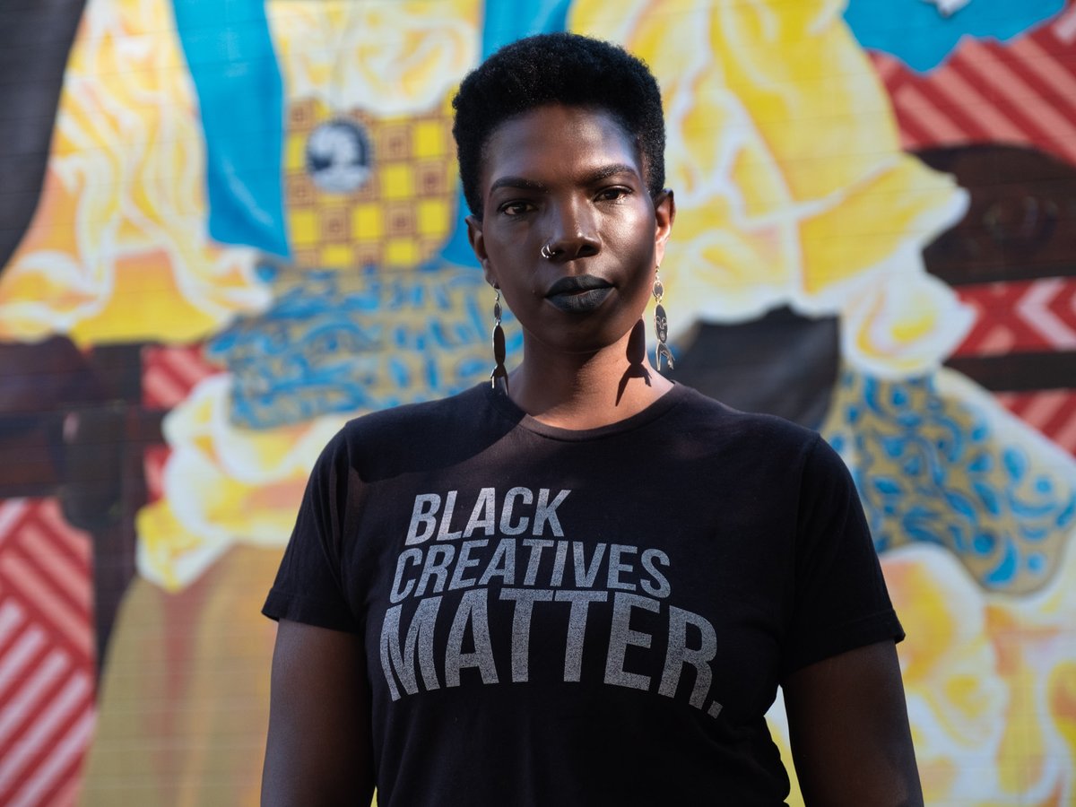 Faith McKinnie of the Black Artists fund stands in front a Sacramento Wide Open Walls Mural by Shonna McDaniels on Wednesday Oct 28, 2020.