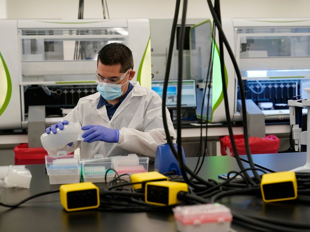 A technician conducts COVID-19 tests at a facility in Valencia on Oct. 30, 2020.