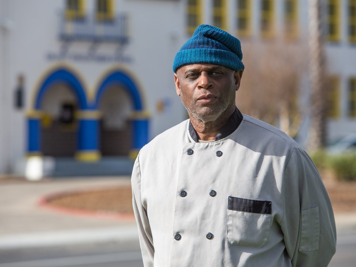 Lambert Davis, in front of Grant Union High School from where he graduated in 1976.