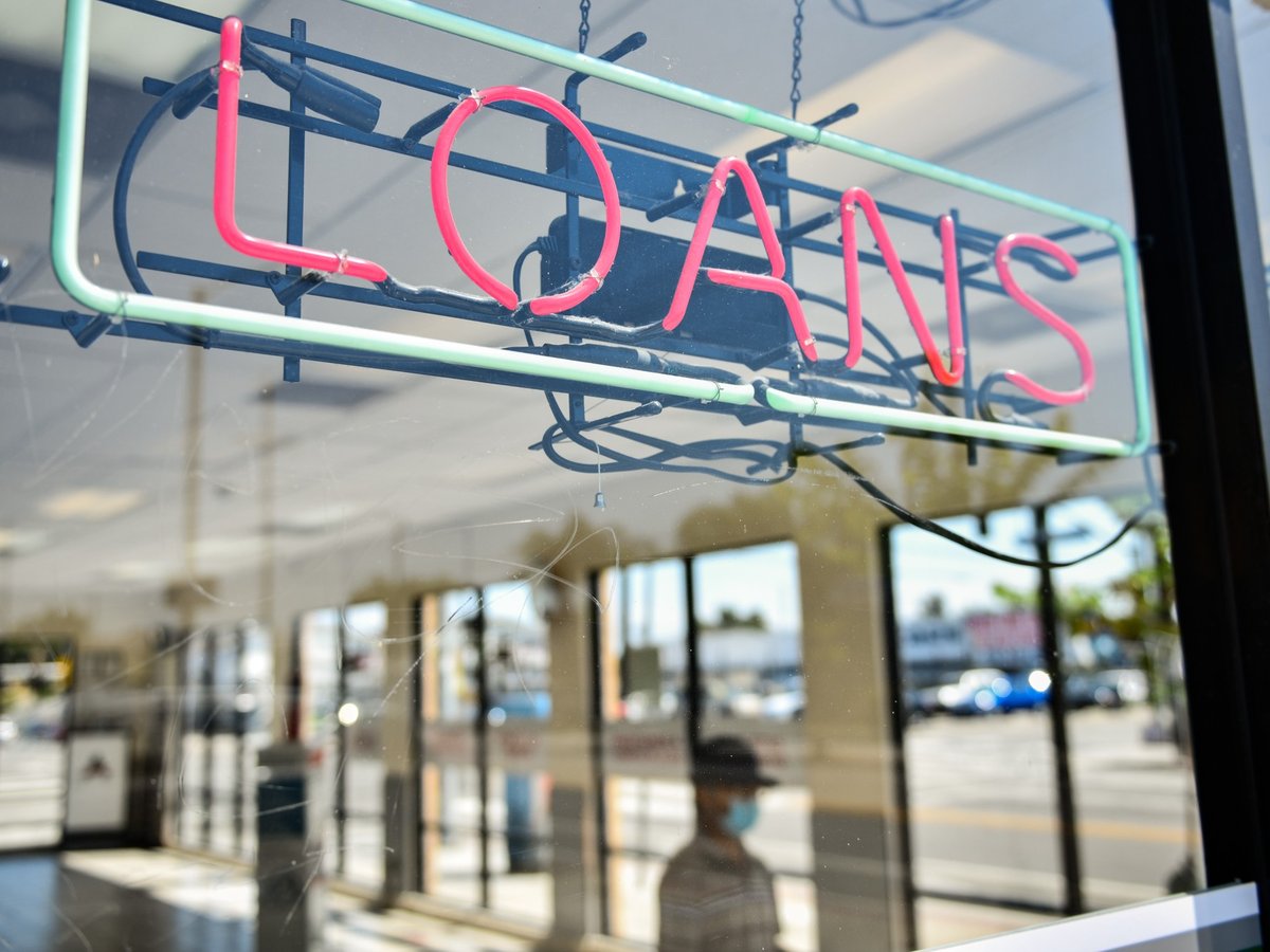 A customer inside a loan agency, ACE Cash Express, in Wilmington on July 28, 2021.
