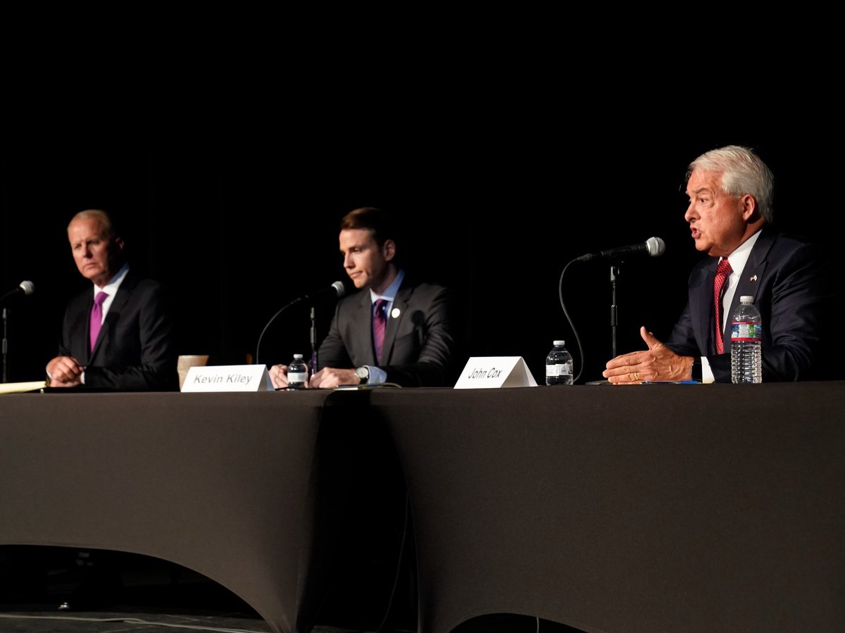 Republican gubernatorial candidate John Cox, right, responds to a question during a debate with challengers Assemblyman Kevin Kiley, R-Rocklin, center, and former San Diego Mayor Kevin Faulconer, left in Sacramento, Calif., Tuesday, Aug. 17, 2021.