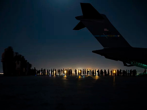 A U.S. Air Force air crew prepares to load evacuees aboard a C-17 aircraft at Hamid Karzai International Airport in Kabul, Afghanistan, on Aug. 31. Several public school students from Sacramento remain in Afghanistan since the U.S. evacuation ended.