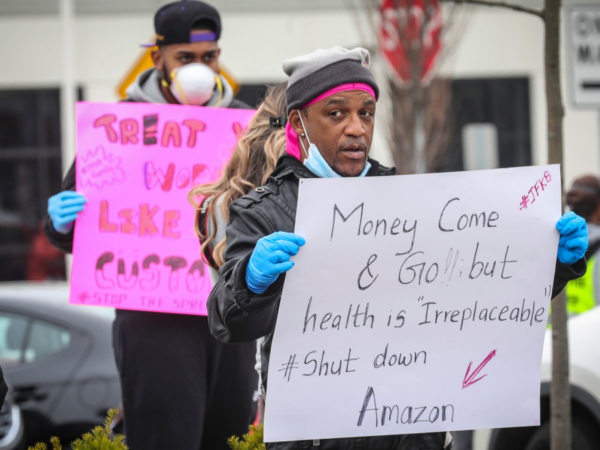 In this March 30, 2020 file photograph, workers from an Amazon fulfillment center in Staten Island, N.Y., protest conditions over fears COVID-19 virus spread, at the company's warehouse in New York.