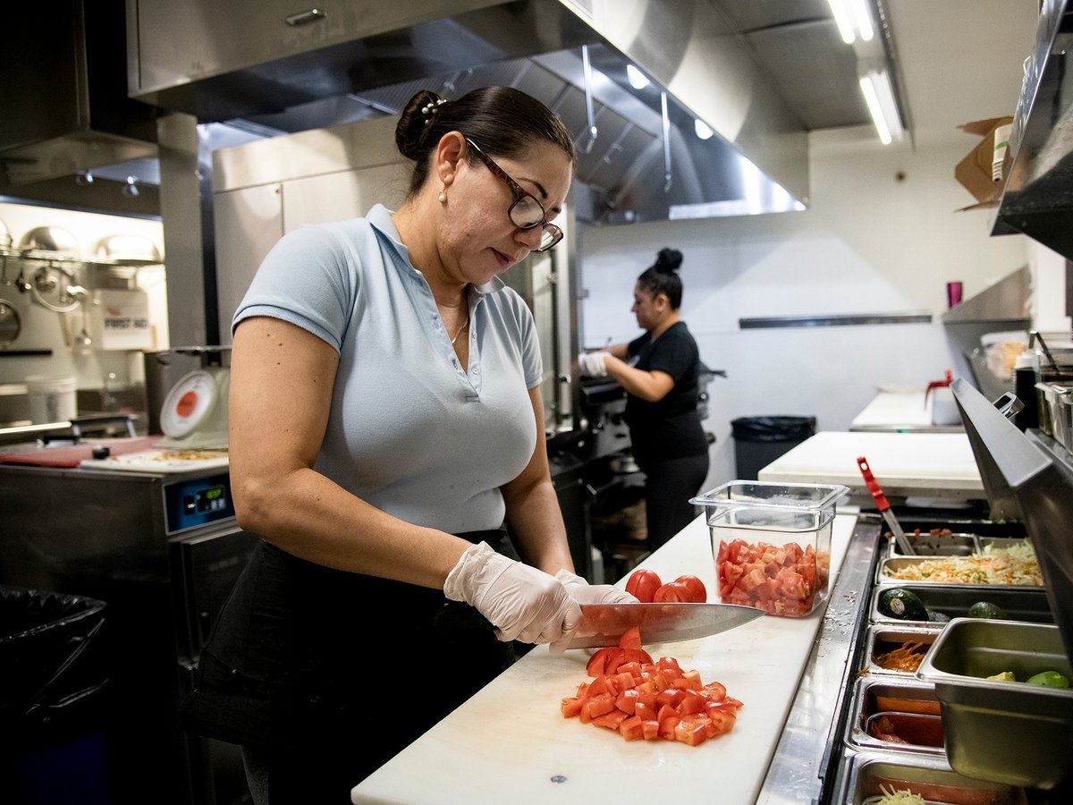 Cook Martha Garcia preps food in the kitchen at Verde Mexican Rotisserie in South Lake Tahoe on Oct. 6, 2021.