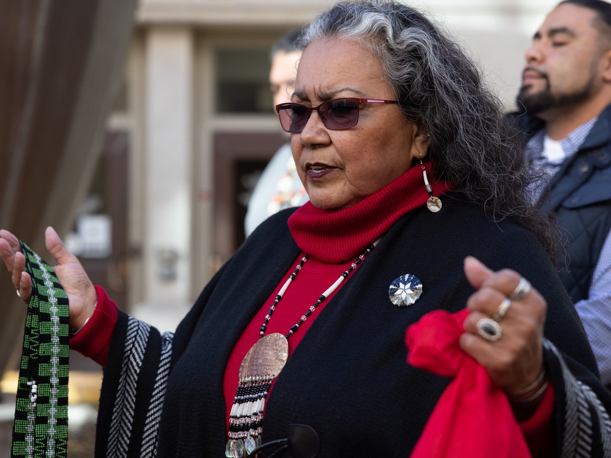 Mary Tarango of Wilton Rancheria leads a prayer at a press conference about a land acknowledgement for city council meetings outside Sacramento City Hall, Tuesday, Dec. 14, 2021.