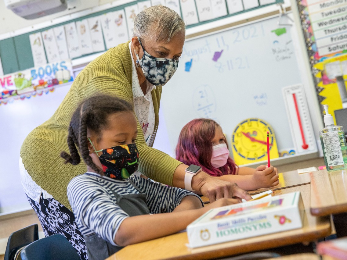 In this Aug. 11, 2021, file photo Joy Harrison instructs her second graders at Carl B. Munck Elementary School, in Oakland, Calif.