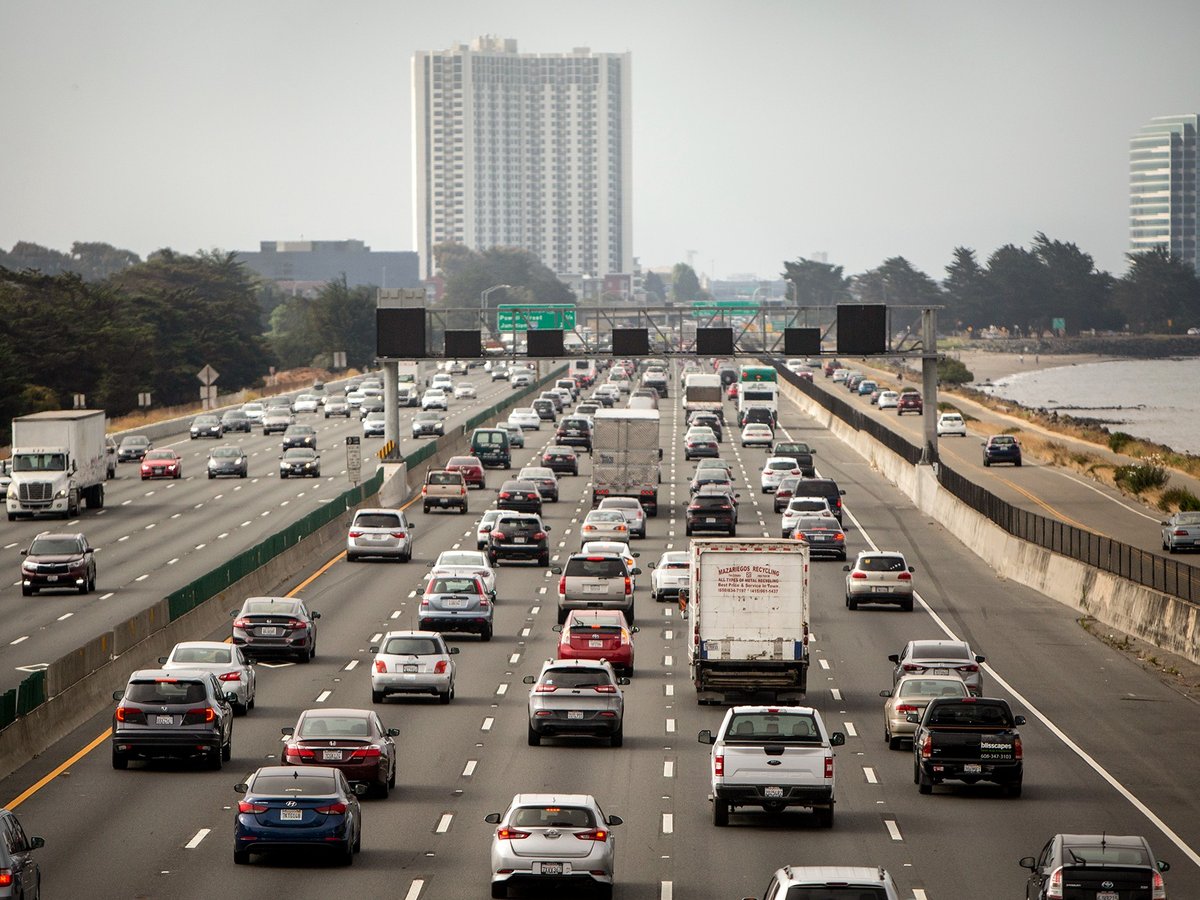 As California gas prices approach $6 per gallon, will proposals to have the state pay car owners blunt a move away from gas-powered driving? Vehicles head westbound on route 580 toward Oakland on July 22, 2019.