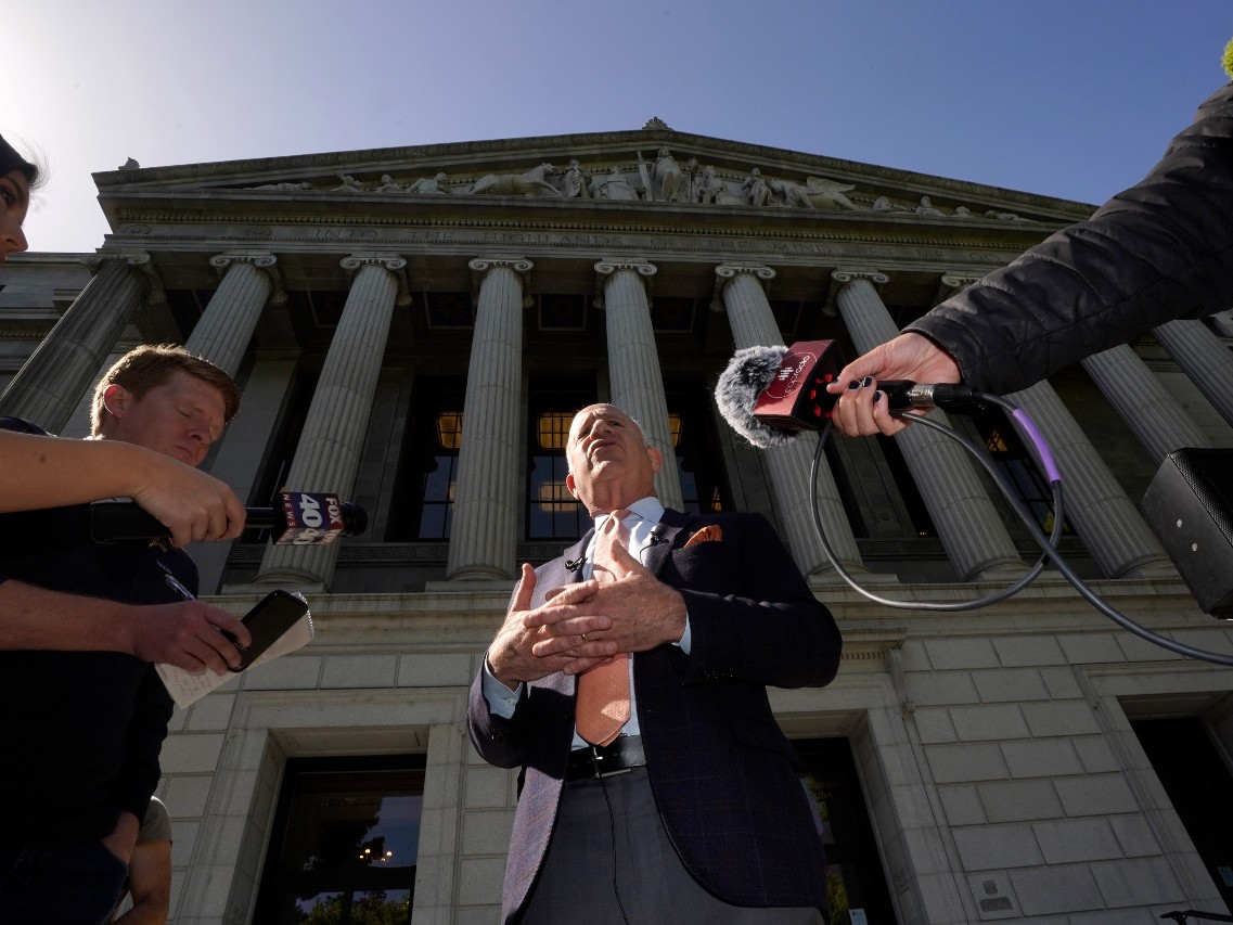 Sacramento Mayor Darrell Steinberg talks with reporters outside the Stanley Mosk Library and Courts Building, Wednesday, April 6, 2022, in Sacramento, Calif., about Sunday's mass shooting.