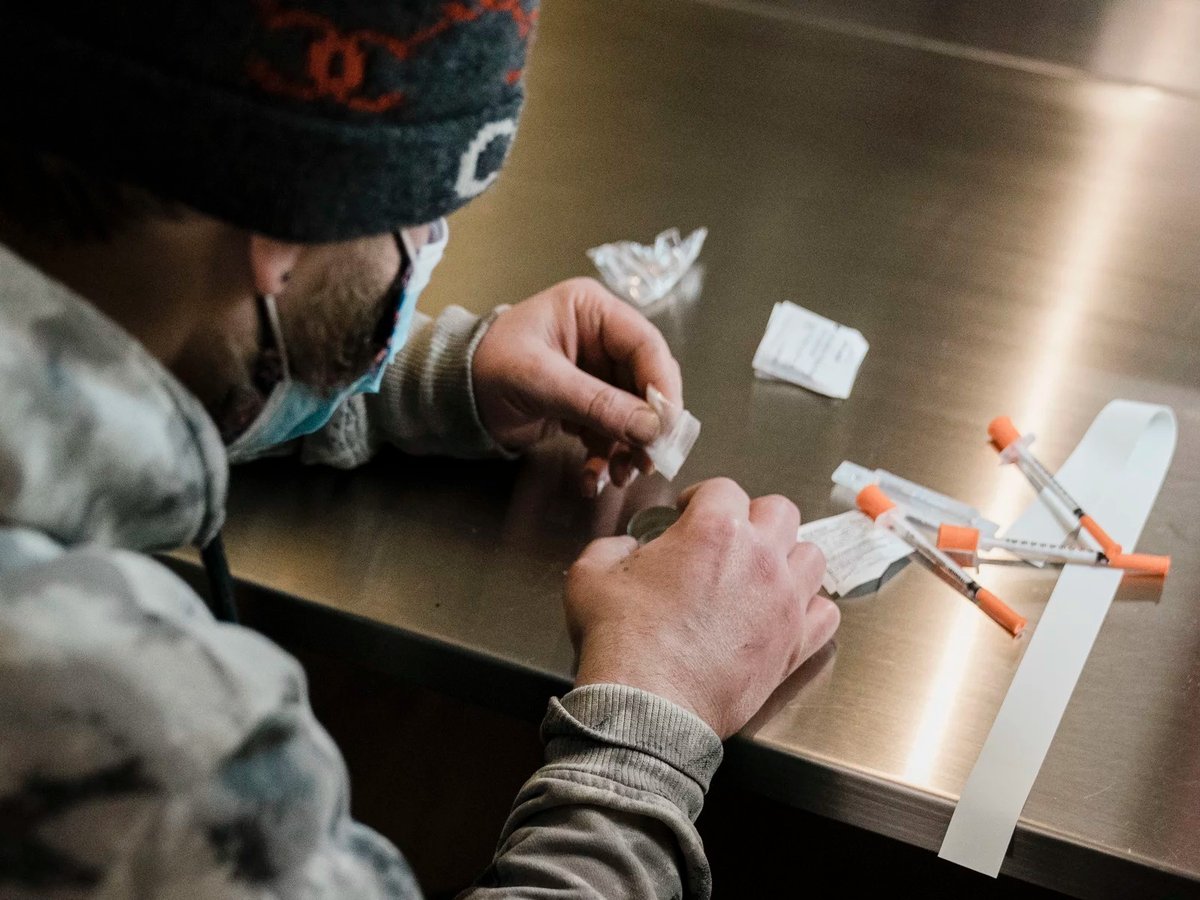 A man uses a safe injection site in New York City in January. A bill in California would allow pilot sites in San Francisco, Oakland and Los Angeles.