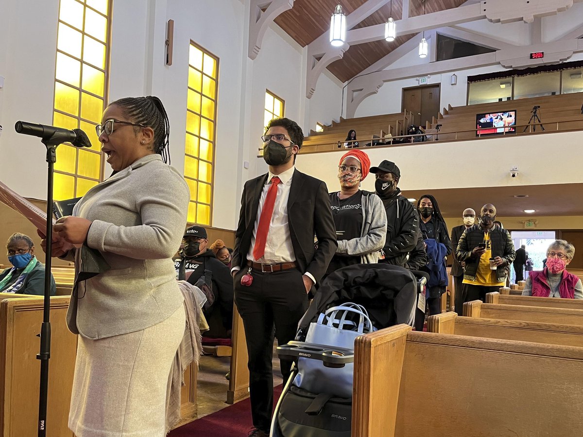 People line up to speak during a reparations task force meeting at Third Baptist Church in San Francisco on April 13, 2022.