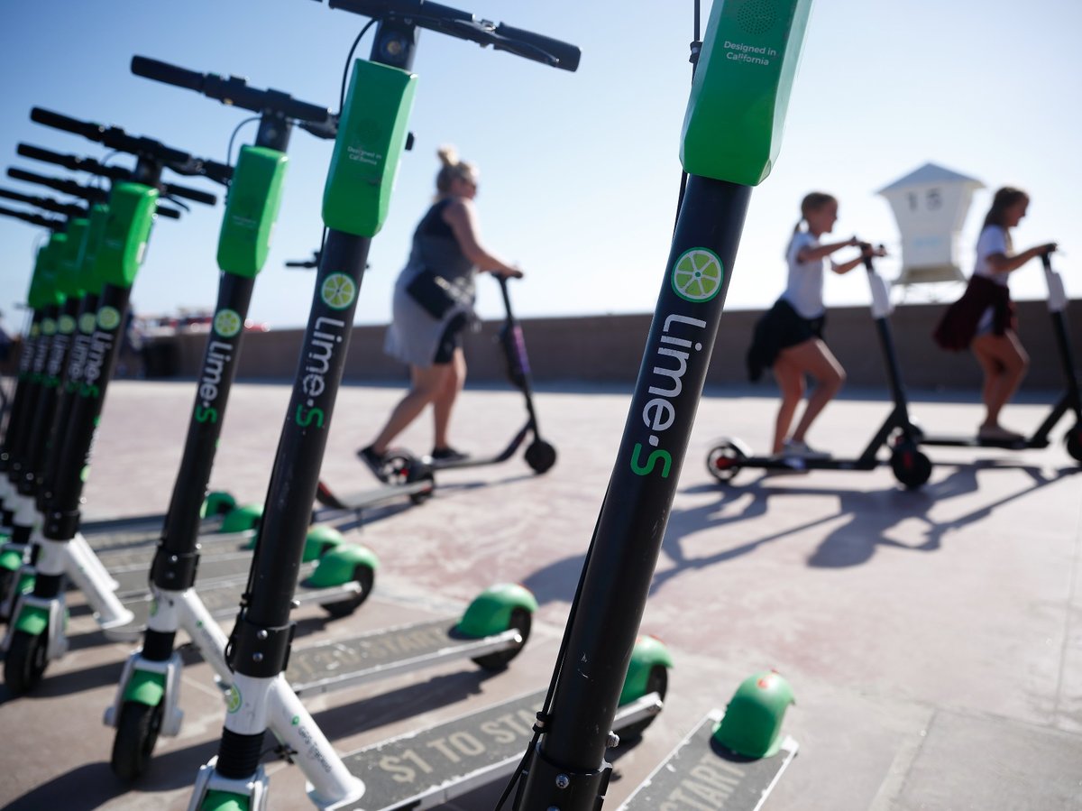 Lime-S scooters are seen along Mission Beach boardwalk Tuesday, May 28, 2019, in San Diego.
