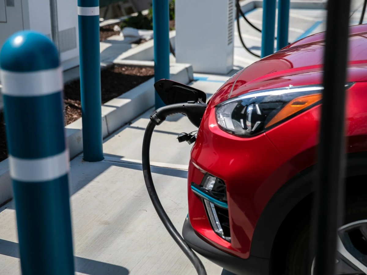 An electric vehicle charges at a station in Millbrae.