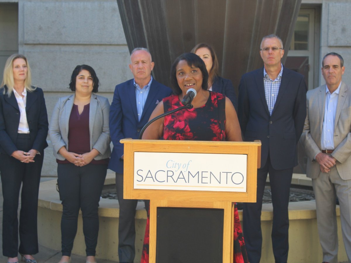 Tina Lee-Vogt, the city of Sacramento’s new nighttime economy manager, speaks at a press conference outside City Hall on Monday, Oct. 3, 2022.