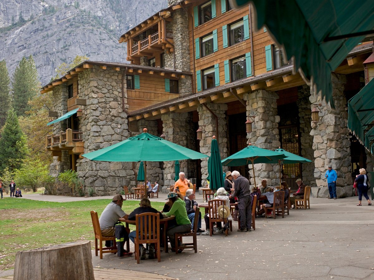 In this Oct. 24, 2015, file photo, people dine outside the Ahwahnee Hotel in Yosemite National Park, Calif.