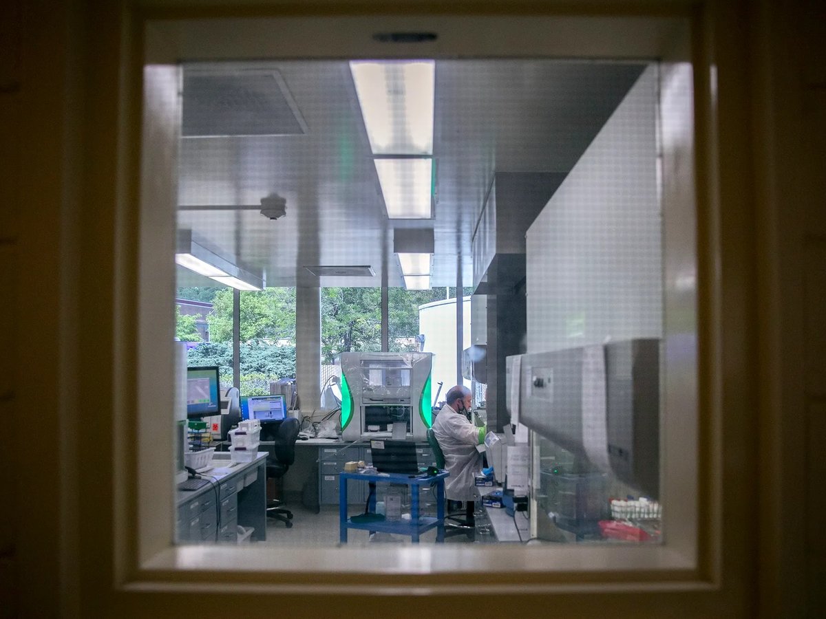 Clinical lab scientist, Bryan Dzebkowski, works with COVID-19 test samples in a lab at the Sonoma County Department of Public Health on June 8, 2021. Dzebkowski was hired by the department specifically to work with COVID-19 tests.