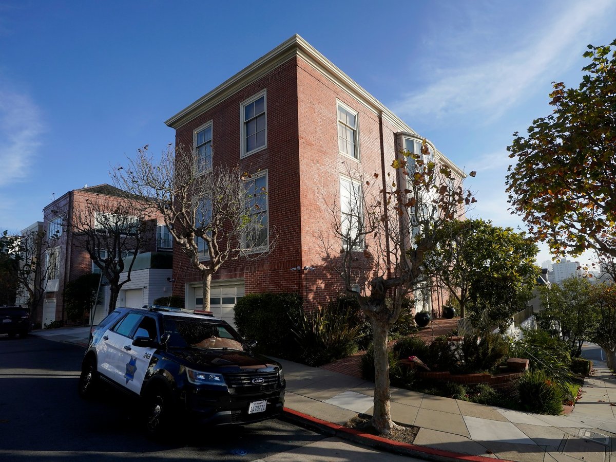 A police vehicle is parked outside the home of House Speaker Nancy Pelosi in San Francisco, on Saturday, Oct. 29, 2022.