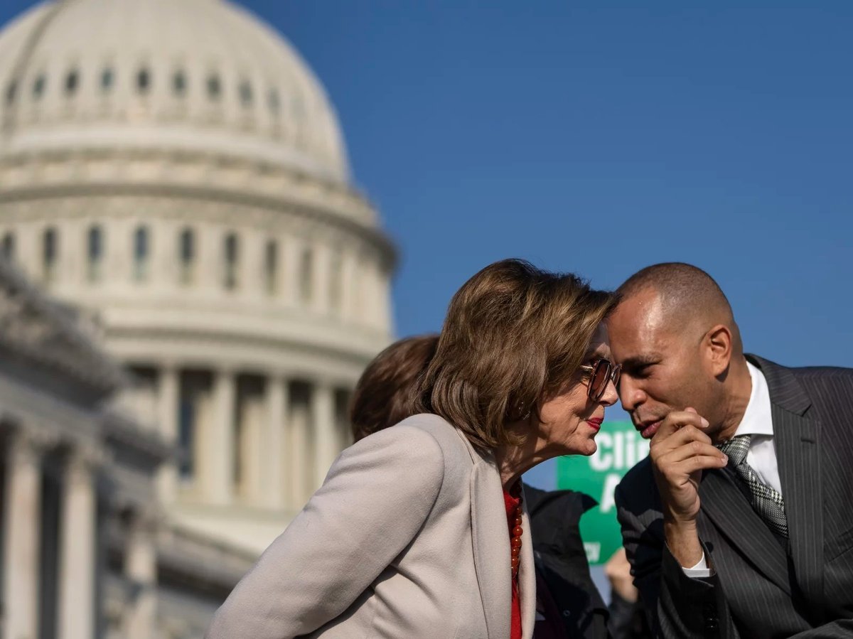Speaker of the House Nancy Pelosi, D-Calif., speaks with Rep. Hakeem Jeffries, D-N.Y., during a news conference with House Democrats about the Build Back Better legislation, outside of the Capitol in 2021.