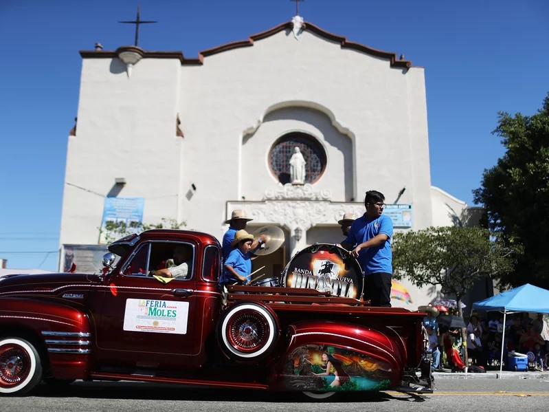 A lowrider cruises through the 72nd annual East LA Mexican Independence Day Parade on Sept. 16, 2018, in Los Angeles.