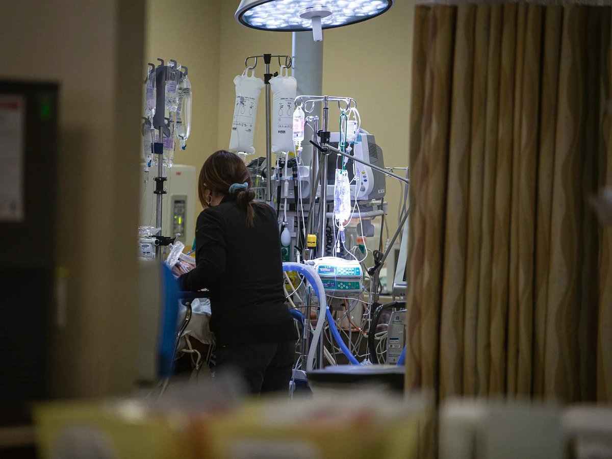 A nurse checks on a patient in the Emergency Room unit of Hazel Hawkins Memorial Hospital in Hollister on March 30, 2023.