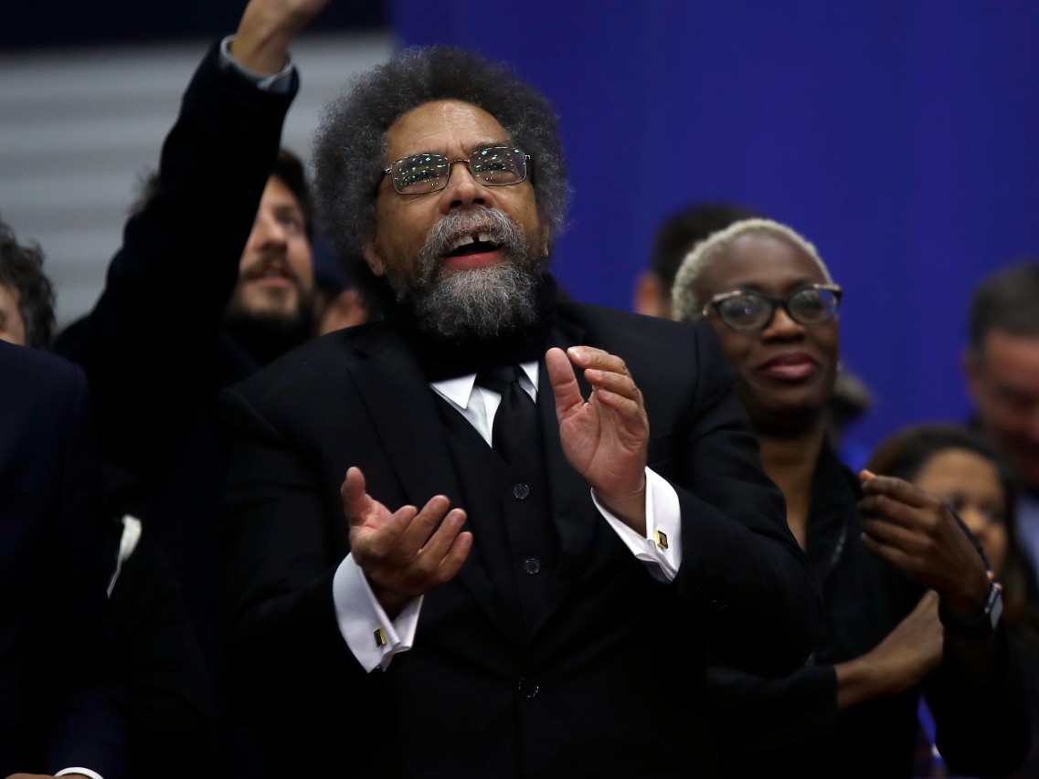 Cornel West listens to Democratic presidential candidate Sen. Bernie Sanders, I-Vt., speak to supporters at a primary night election rally in Manchester, N.H., Tuesday, Feb. 11, 2020.