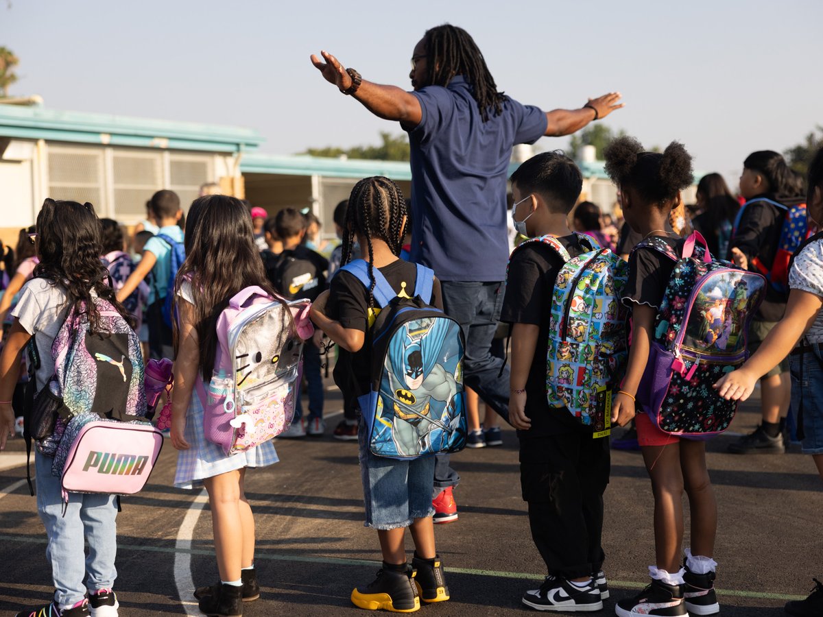 Students line up before the first day of school at John Sloat Elementary School in Sacramento, Calif., on Thursday, Aug. 31, 2023.