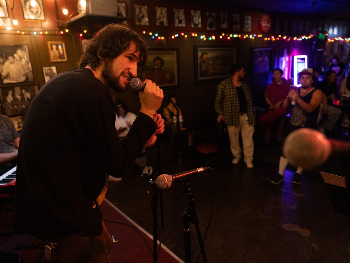 Jacob Swedlow of LabRats announces the start of Sunday Sessions at Torch Club on Sunday, Aug. 20, 2023.