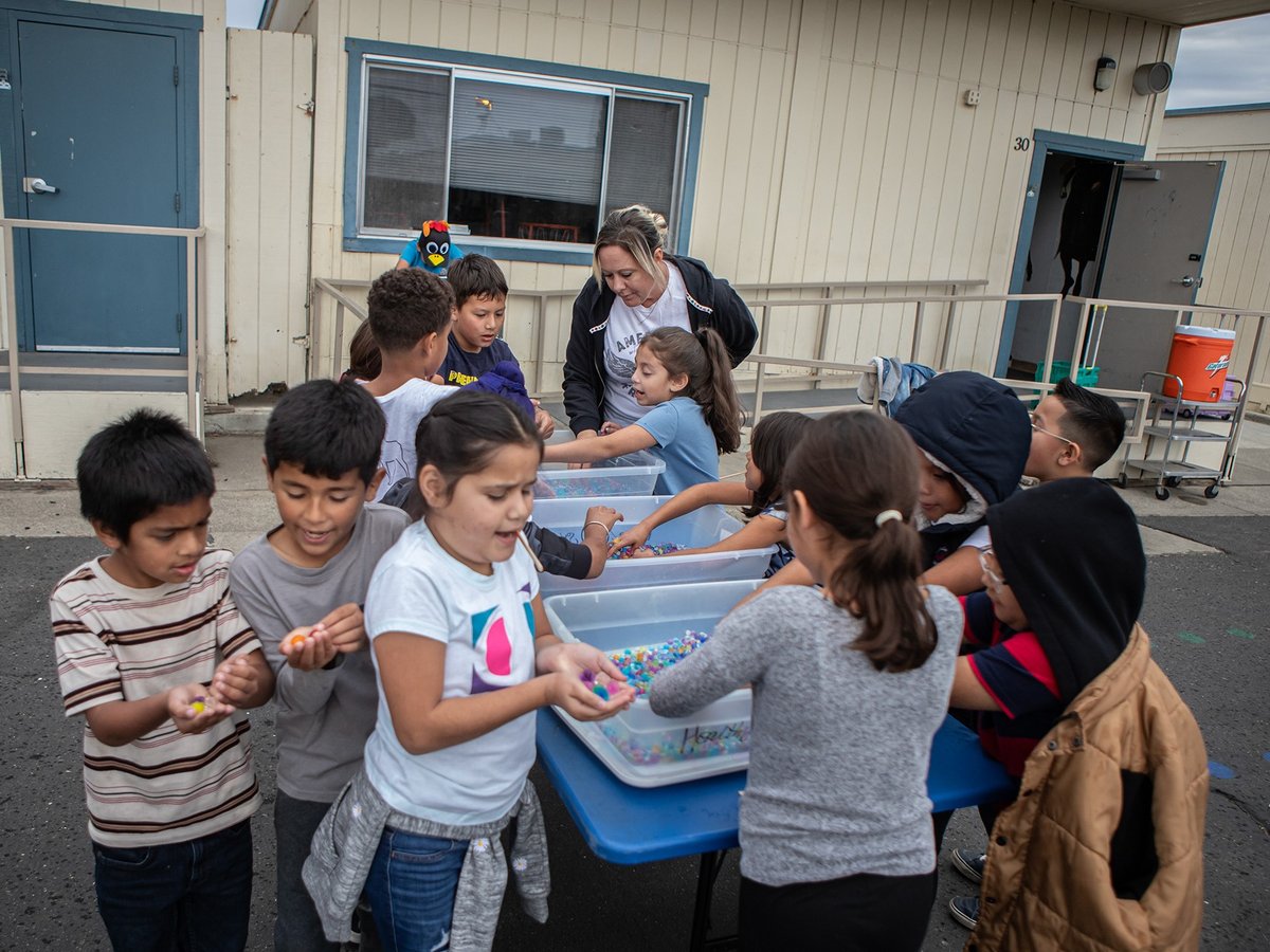 Students being taught a science lesson outside of the classroom at the Keyes Elementary School in Keyes on Nov. 15, 2023.