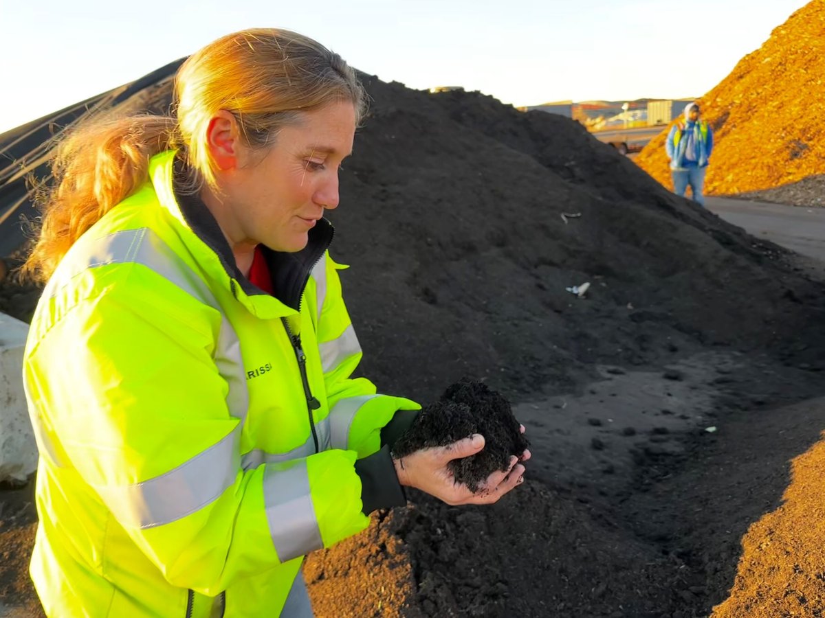Marissa Juhler, director of the Integrated Waste Management Division at the Yolo County Central Landfill, displays a handful of compost made from residents’ organic waste at the Yolo County Central Landfill on Dec. 8, 2023.