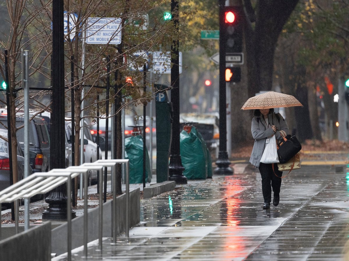 Rain falls in downtown Sacramento on Dec. 18, 2023.
