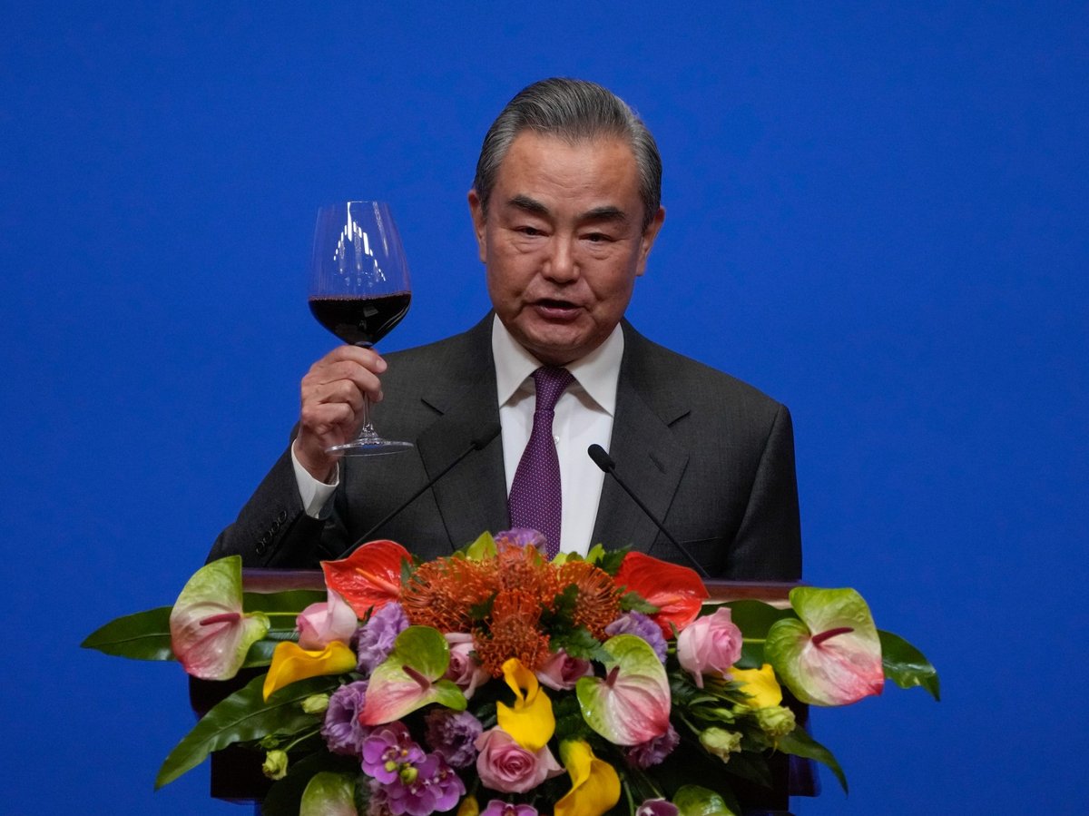 Chinese Foreign Minister Wang Yi gives a toast to invited guests after delivering a speech at a reception for Commemoration of the 45th Anniversary of China-U.S. Diplomatic Relations at the Diaoyutai Guest House in Beijing, Friday, Jan. 5, 2024.