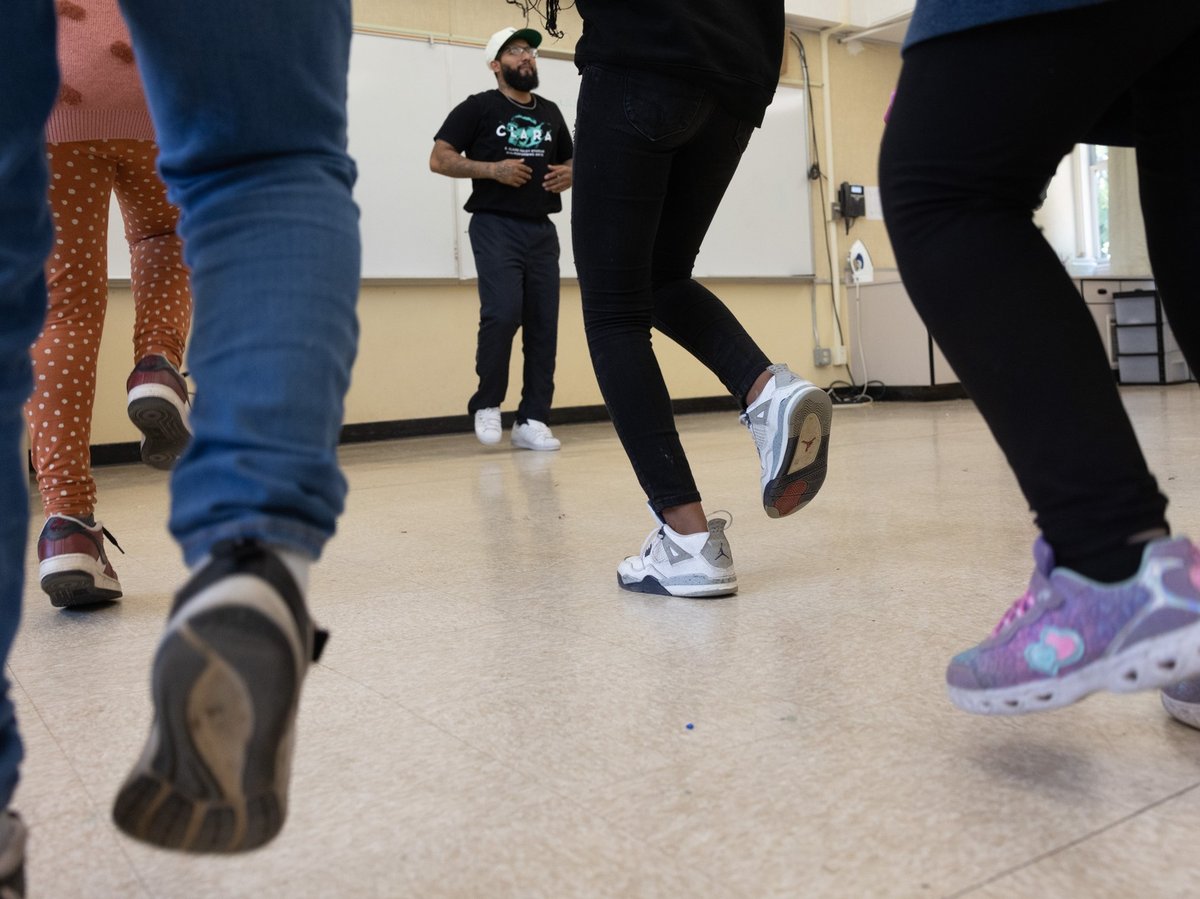 Teaching artist Alex Almaraz teaches hip-hop dance to a class at Ethel Phillips Elementary School in Sacramento, Calif., on Friday, May 26, 2023.