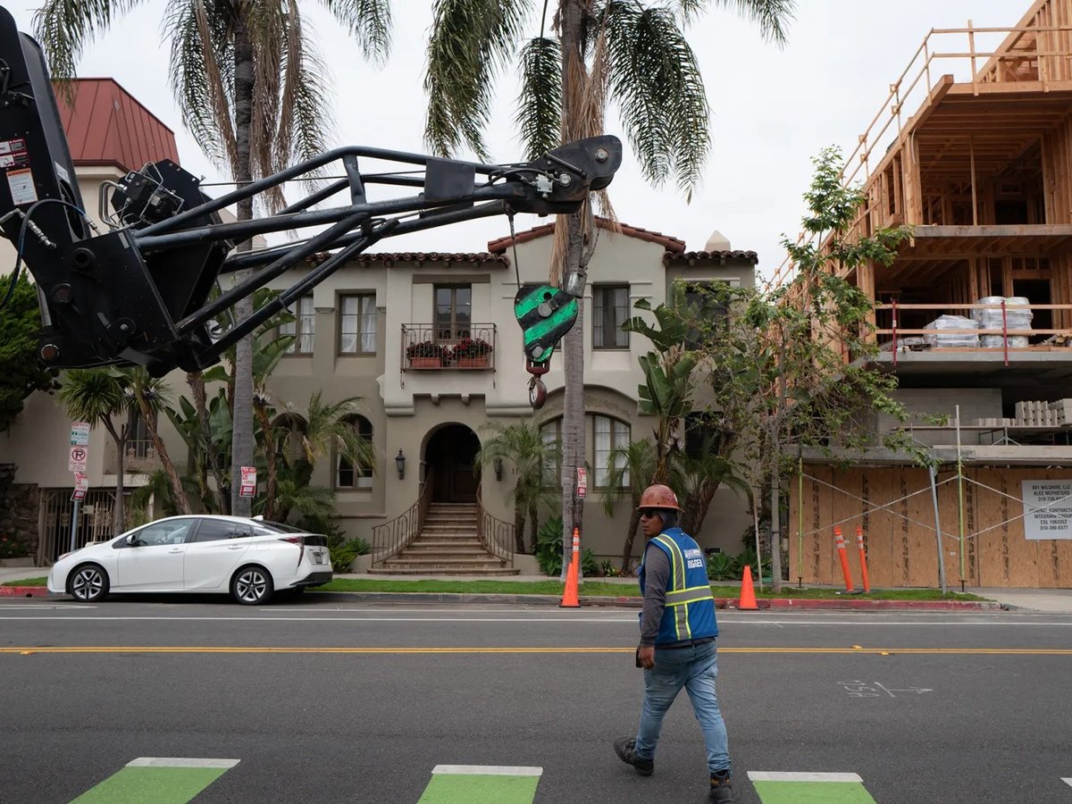 A building set to have 40 apartment units with four retail stores is under construction at the intersection of Wilshire and 6th Street in Santa Monica. May 24, 2023.