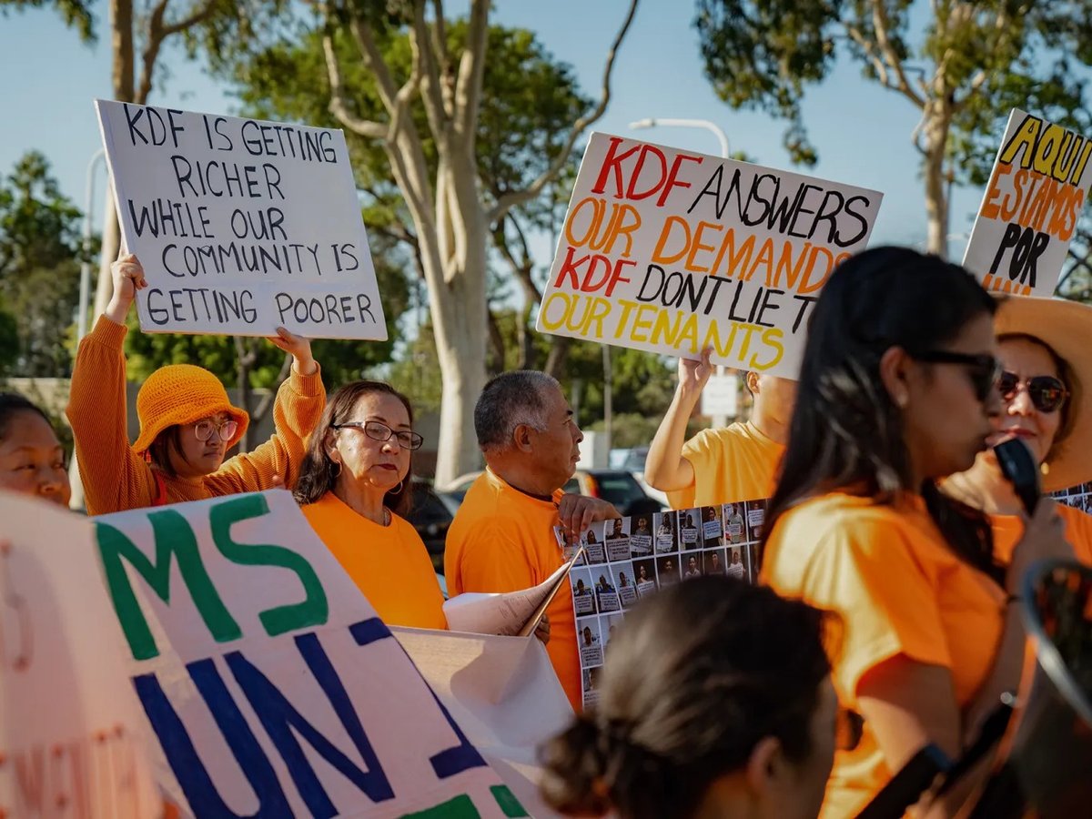 Bay Area tenants from the KDF Tenants Association protest housing conditions and rent increases outside the office complex that houses KDF Communities LLC's office in Newport Beach on Oct. 26, 2023.
