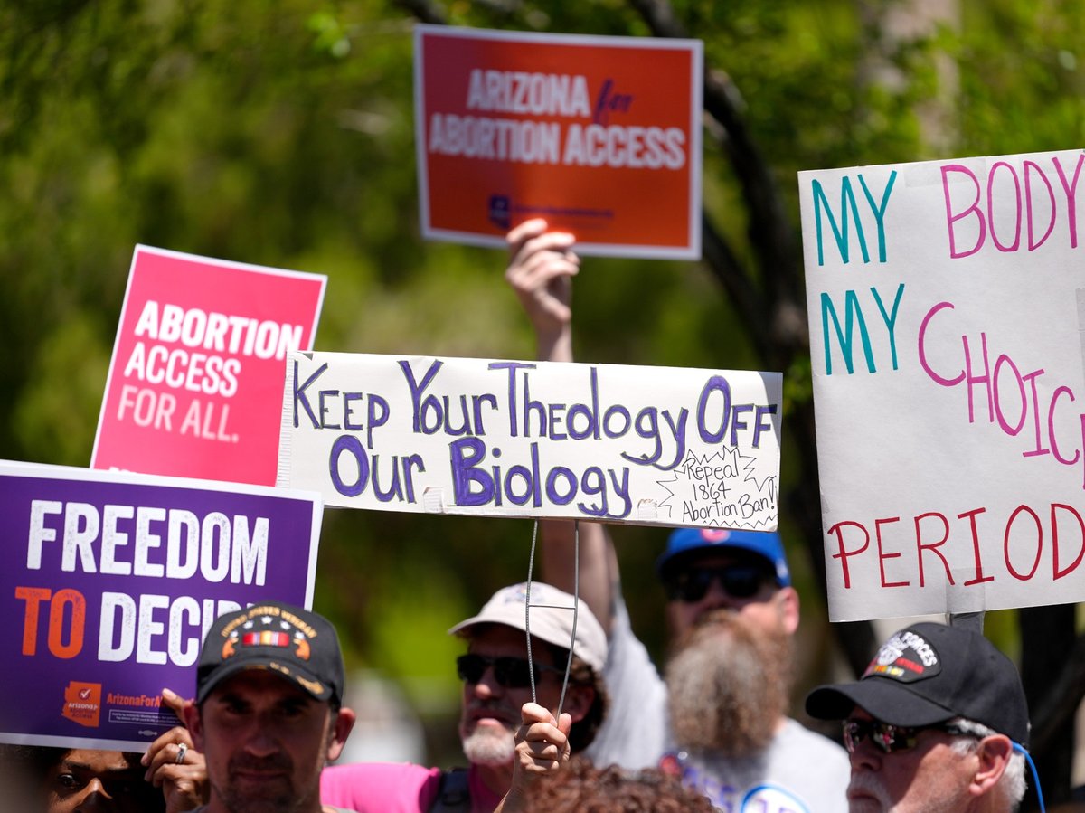 Abortion rights supporters gather outside the Capitol, Wednesday, April 17, 2024, in Phoenix.