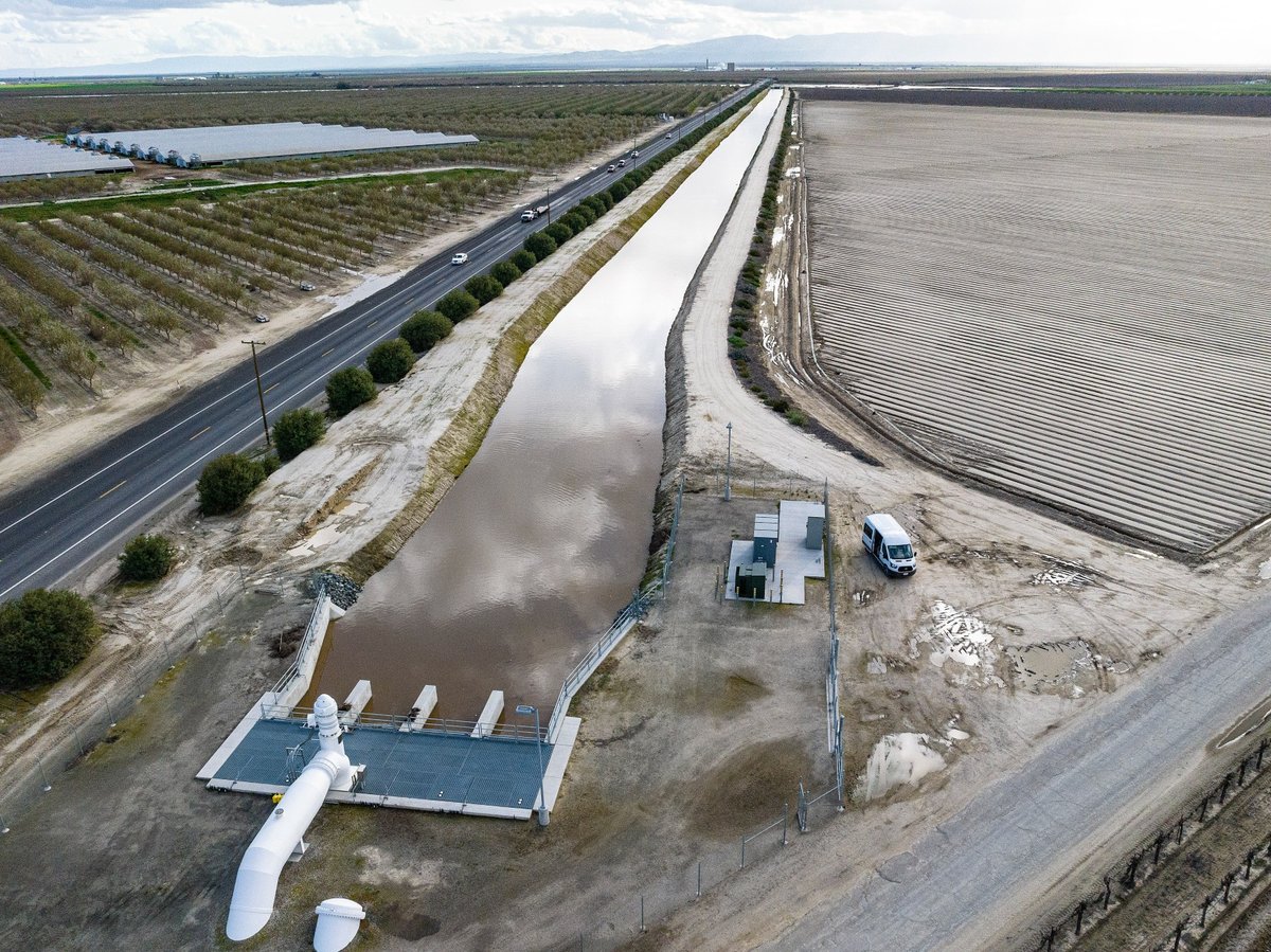 In this aerial drone photo provided by the California Department of Water Resources, the primary pump in the foreground is part of a groundwater recharge project which captures excess flow for groundwater storage in Fresno County on March 13, 2023.