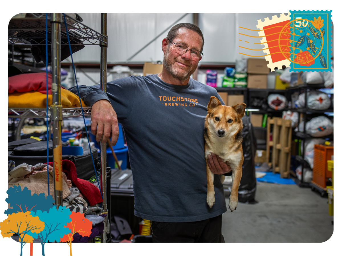 Mark Lytal stands in a warehouse at the Sacramento Pipeworks property in the River District north of downtown. Lytal founded a free mobile shower program for the city's unhoused residents at the site and hands out supplies from the warehouse.