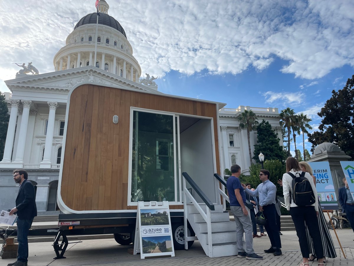 Boss Cubez tiny homes appear outside of the California state Capitol in August 2024.