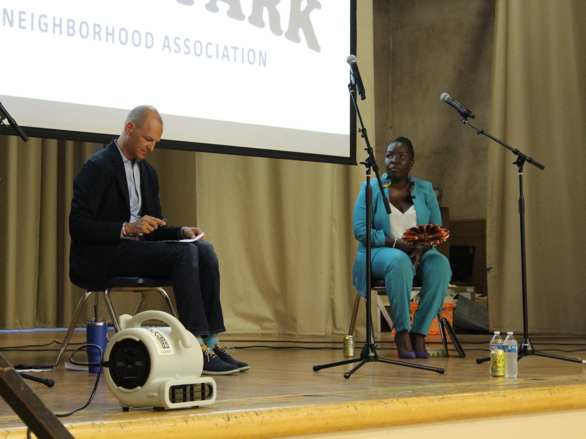 Assembly member Kevin McCarty and epidemiologist Dr. Flo Cofer listen to a question at a Sacramento mayoral candidate debate at Tahoe Elementary School in Sacramento, Calif., on Sept. 6, 2024.
