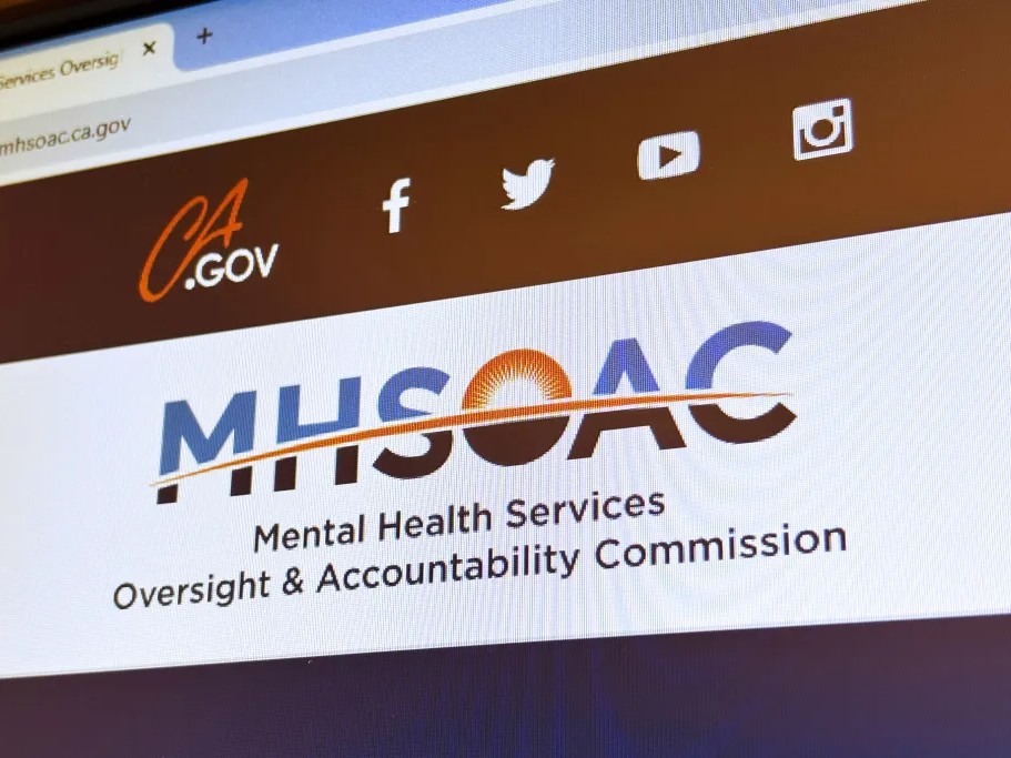 Toby Ewing, executive director of California’s Mental Health Services Oversight and Accountability Commission, is resigning amid an investigation into his conduct and revelations that he traveled to the U.K. courtesy of a vendor.