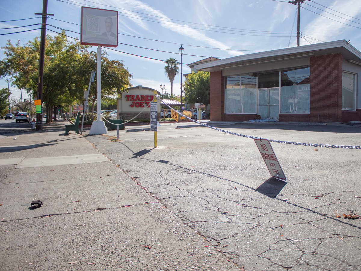 A raised chain with a sign reading "No parking any time" Thursday, Oct. 10, 2024, at the old location of Burr’s Fountain at 4920 Folsom Blvd. in Sacramento.