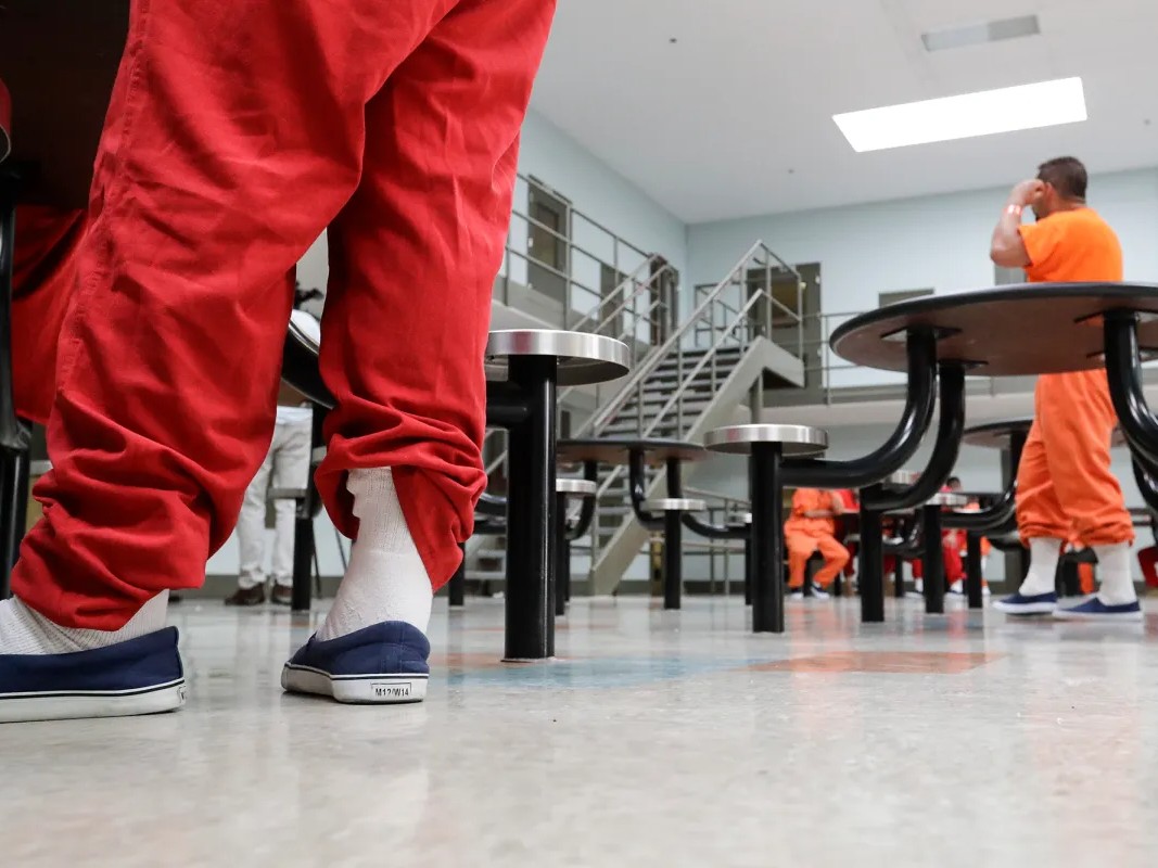 ICE is looking to add to its six detention facilities in California with a new one in the Bay Area. Detainees at an ICE Processing Center housing unit in Adelanto gather in a common area on Aug. 28, 2019.