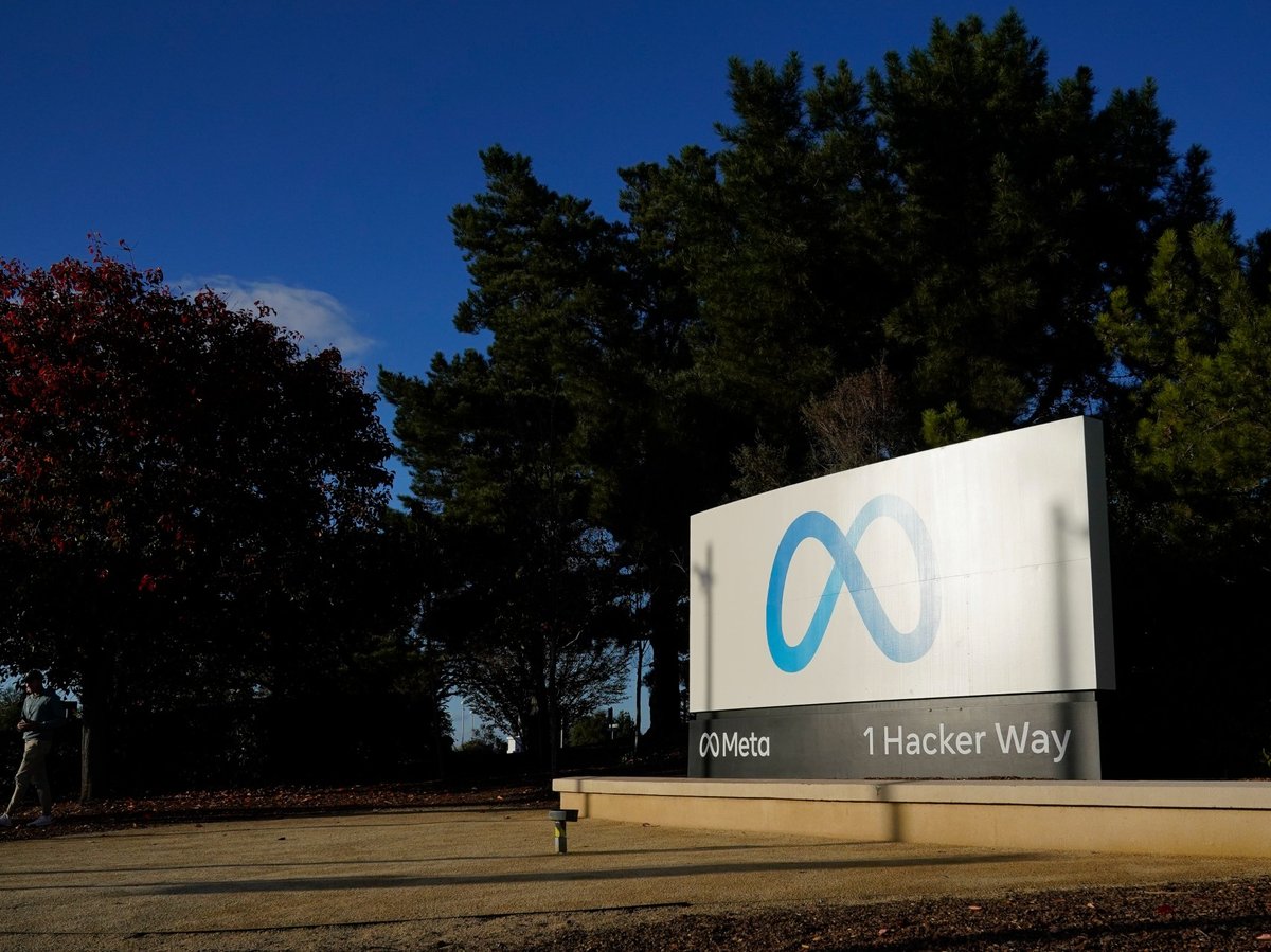Meta's logo can be seen on a sign at the company's headquarters in Menlo Park, Calif., Wednesday, Nov. 9, 2022.