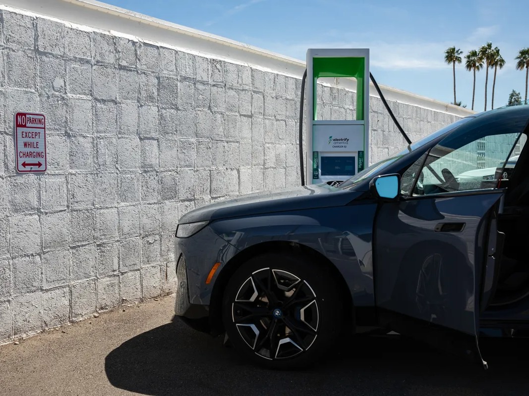 A car is charged at an Electrify America charging station in El Centro. The US EPA today authorized California's zero-emission car mandate that phases out gas-powered cars.